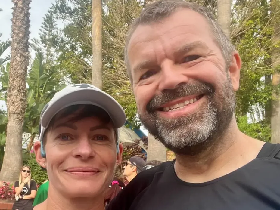 Faye and Phil Morse smiling together after a race